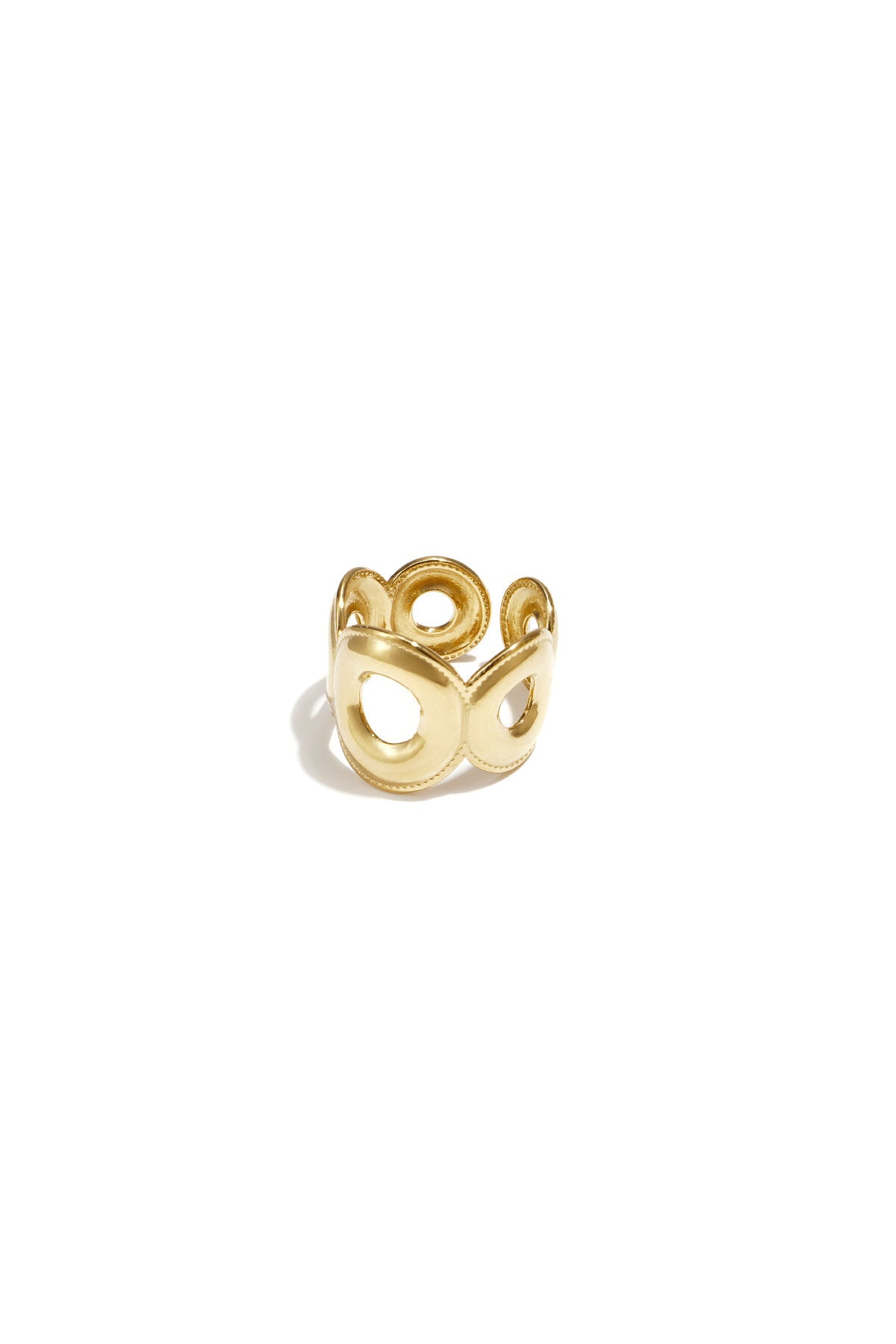Anillo Cerchi · banda ancha de círculos calados, acero dorado