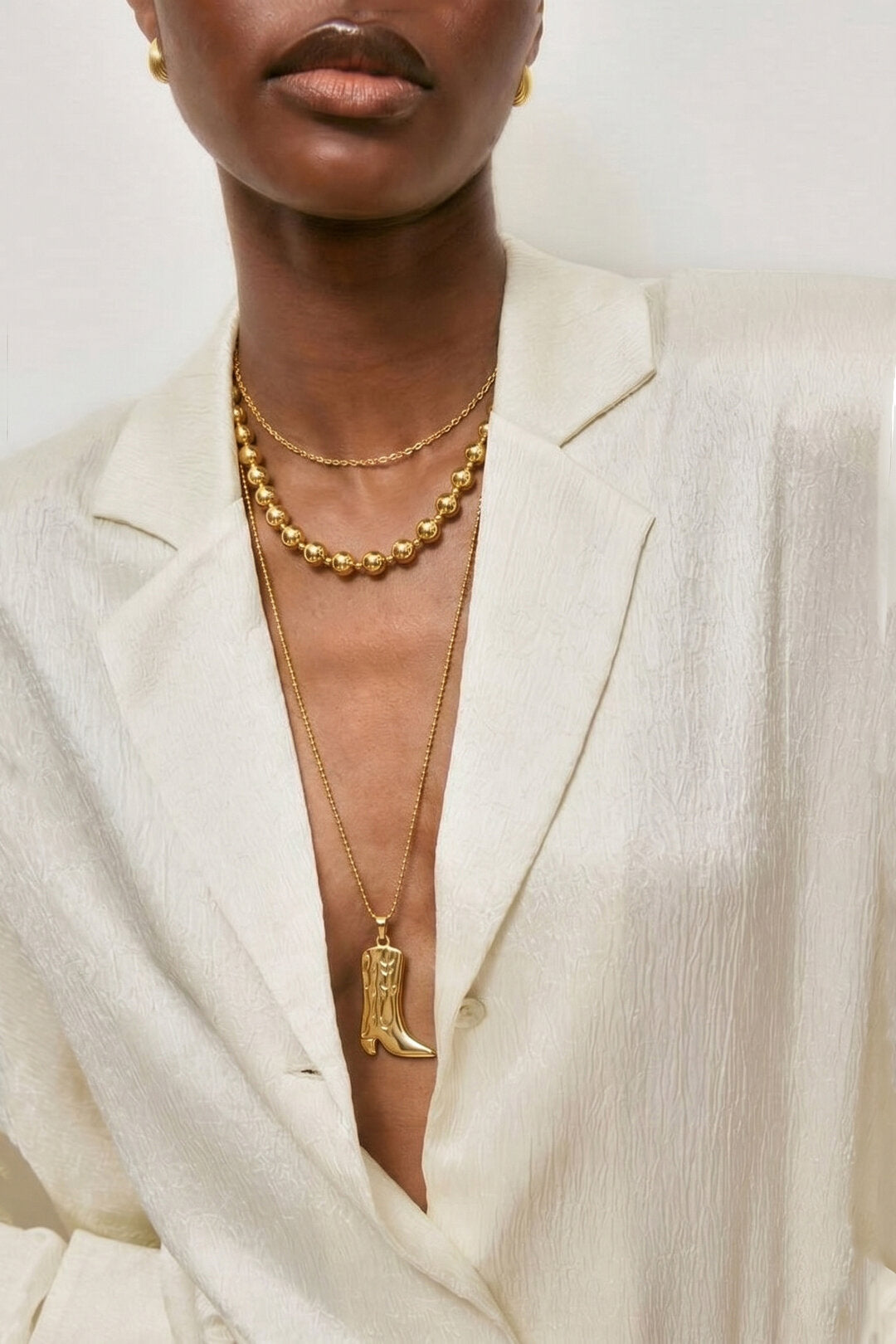 Collar Stivale · colgante de bota en acero dorado — vista 2