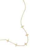 Collar Stelline · motivos de cuatro puntas en acero dorado