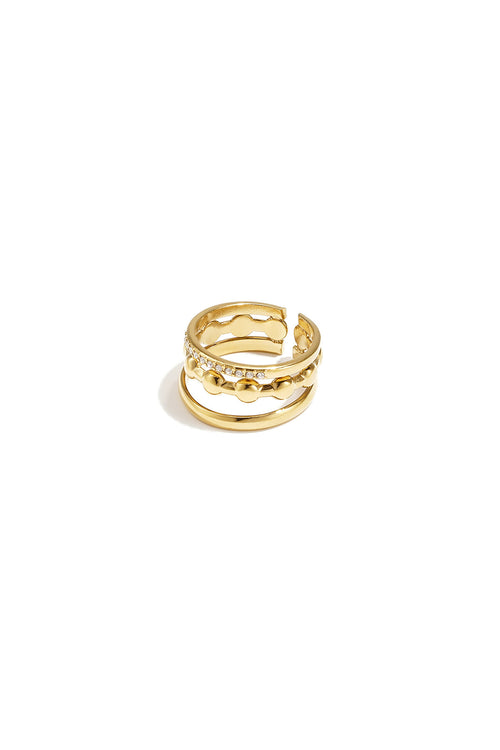 Anillo Strati · triple banda con hilera de circonitas, acero dorado