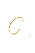 Pulsera Nastro · brazalete con torsión, acero dorado