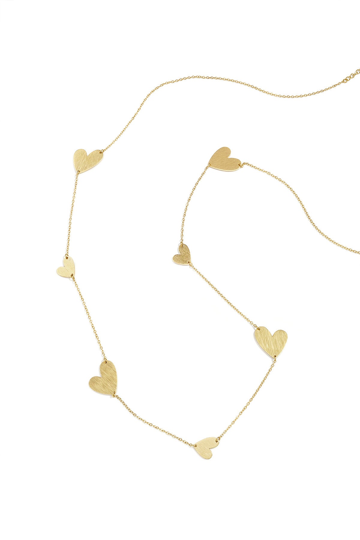 Collar Lungo Cuori · corazones en cadena larga de acero dorado