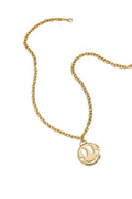 Collar Sorriso · medallón sonriente de acero dorado