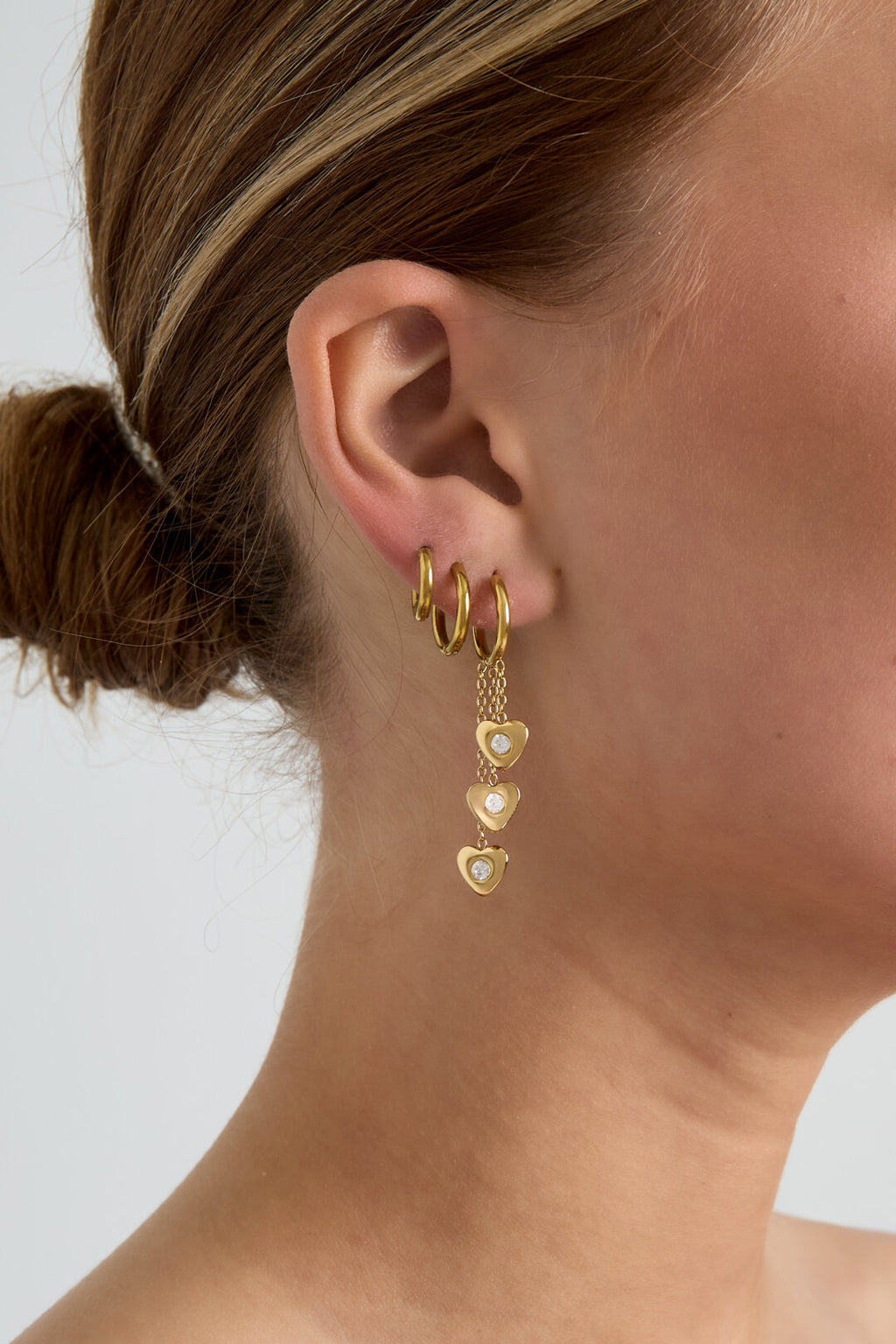 Pendientes Cascata · corazones en cadena, acero dorado — vista 2