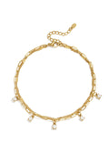 Tobillera Doppia · doble cadena con colgantes de circonita, acero dorado