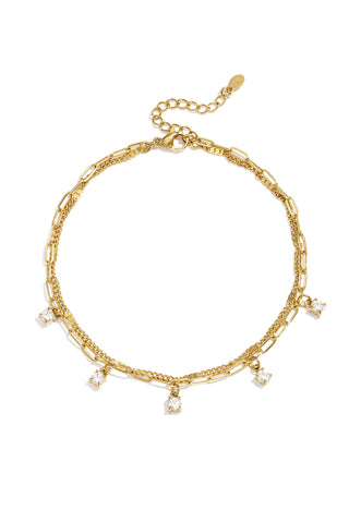 Tobillera Doppia · doble cadena con colgantes de circonita, acero dorado