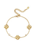 Pulsera Fiori · flores y perlas
