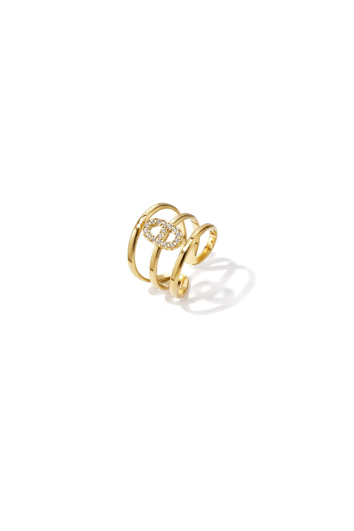 Anillo Maglia · triple aro con eslabón de circonitas, acero dorado