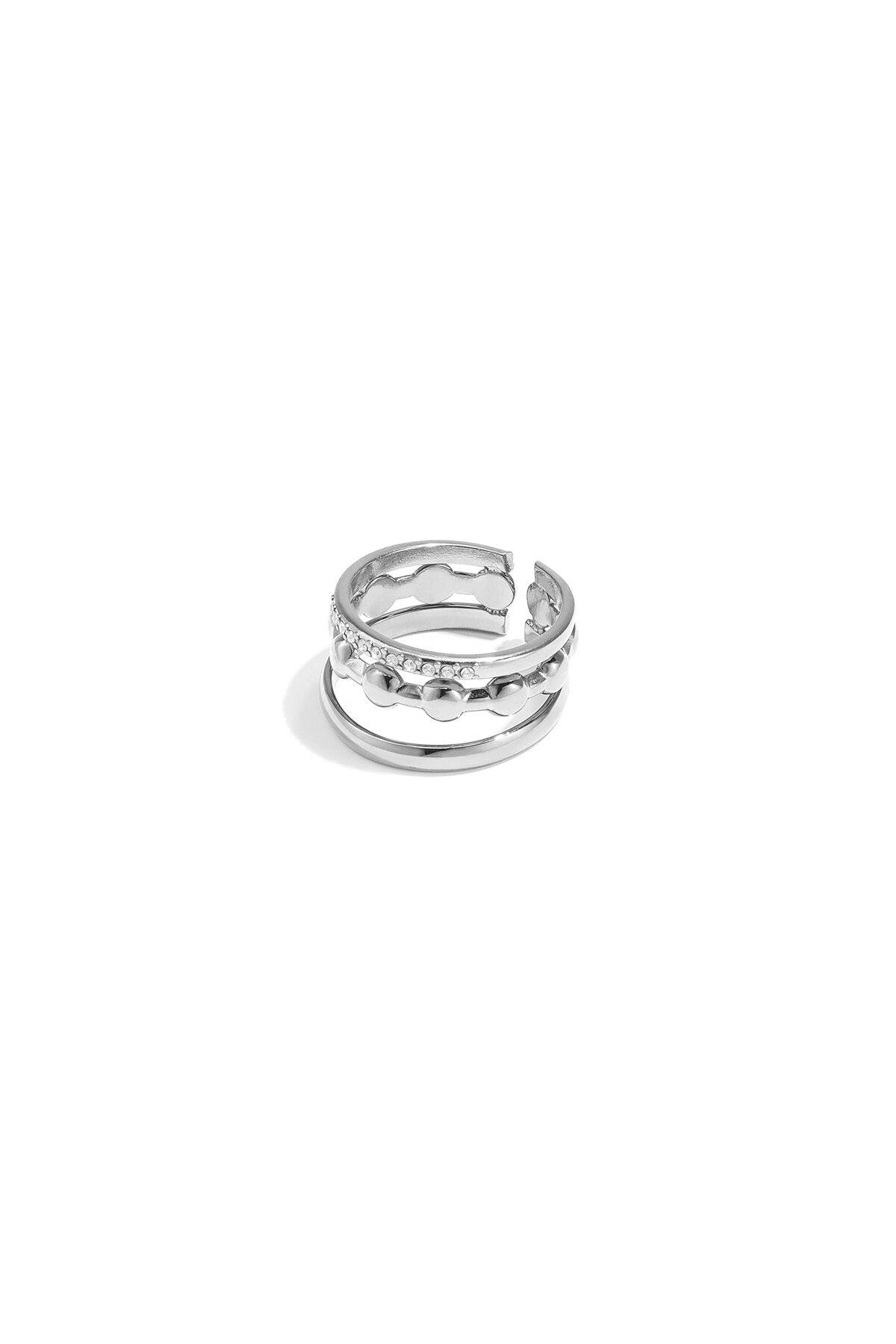 Anillo Strati · triple banda con hilera de circonitas, acero dorado — vista 3